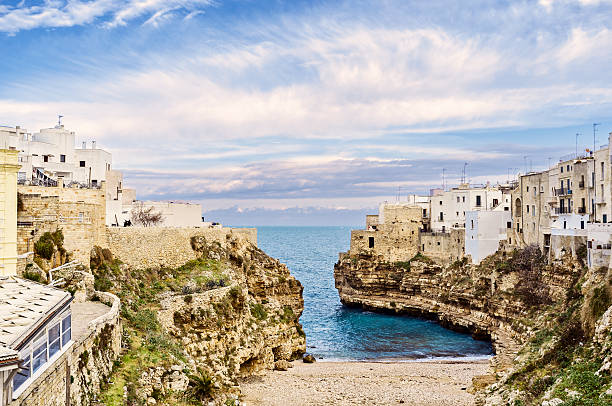 Polignano a Mare View of the Carla Porto beach in Polignano a Mare, Italy. bari photos stock pictures, royalty-free photos & images