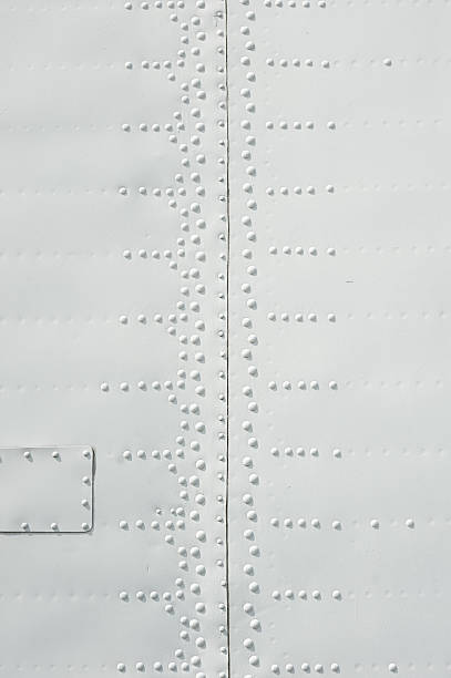 istock texture of the white metal plates with rivets 636795994