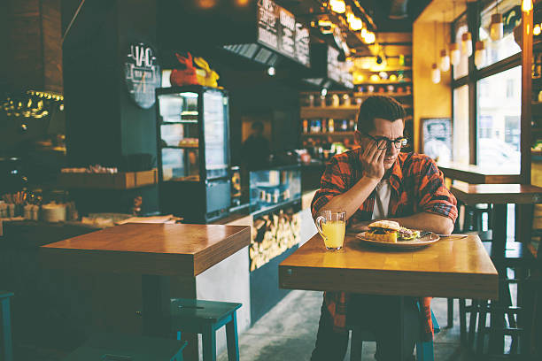 istock Man has no appetite in the restaurant. 636796390