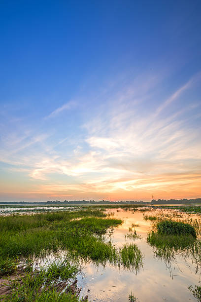 istock Huayyang reservoir at sunset 636797096