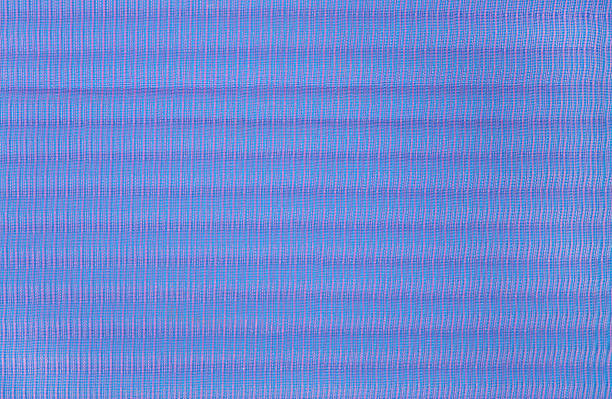 istock Violet pleated transparent caprone cloth as background texture 636797728