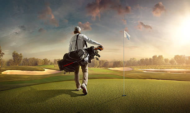 Golf: Man playing golf in a golf course Man playing Golf on beautiful Golf course. The course is made in 3D. game swing stock pictures, royalty-free photos & images