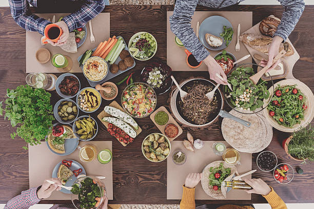istock People eating healthy meal 636801714