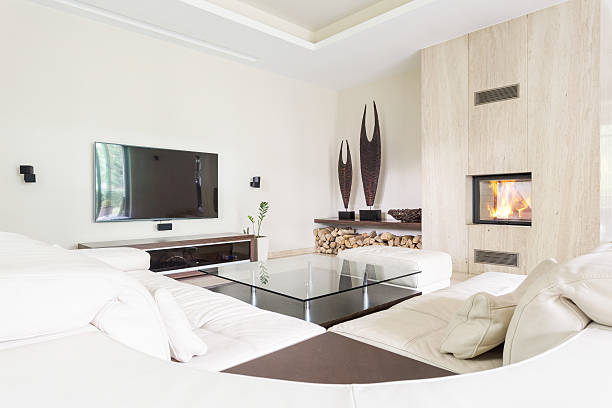 istock Living room with tv and fireplace 636802232