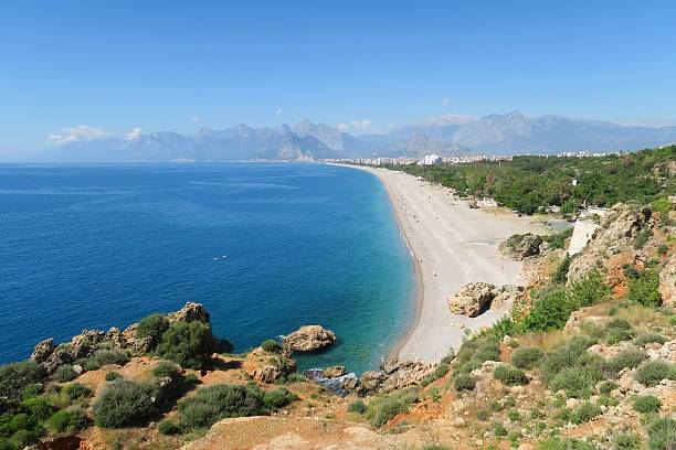 istock Konyaalti Beach, the Taurus Mountains and Cliffs in Antalya, in 636802566