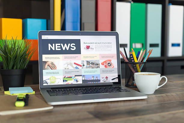 News on Laptop Screen News on Laptop Screen update communication photos stock pictures, royalty-free photos & images