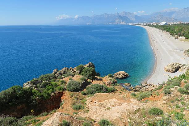 istock Konyaalti Beach and the Taurus Mountains in Antalya, Turkey 636803488