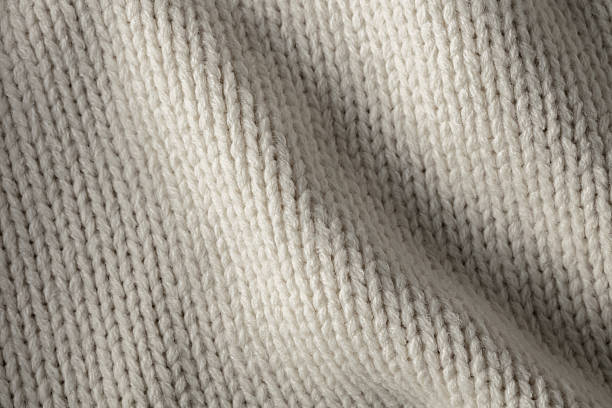 istock texture of a knitted fabric 636808712