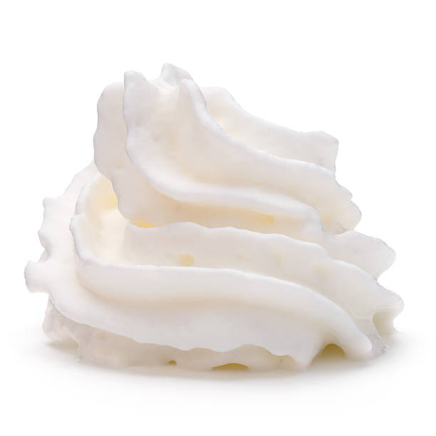 istock Whipped cream swirl  isolated on white background cutout 636809054