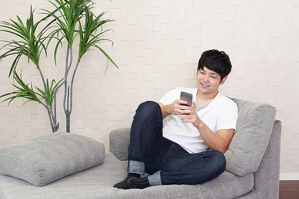 Portrait of an Asian man at home.