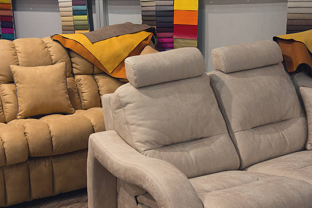 istock Sofas and upholstery samples in the exhibition hall. Sale 636811274