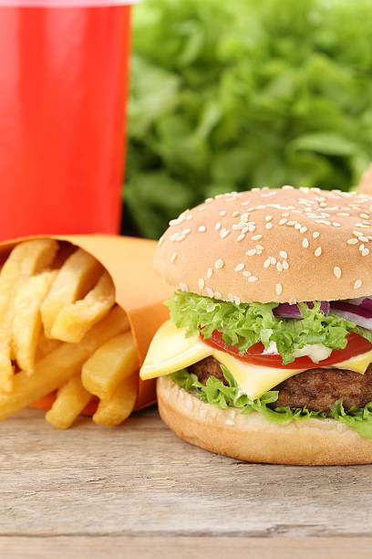 istock Cheeseburger hamburger and fries menu meal combo fast food drink 636813028