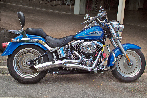 Darwin, NT, Australia - April 28, 2010: Tuned motor bike Harley Davidson on street, a biker's darling 