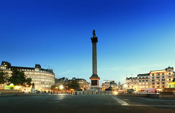 istock Trafalgar Square with Nelson Column at night, London, UK 636817486