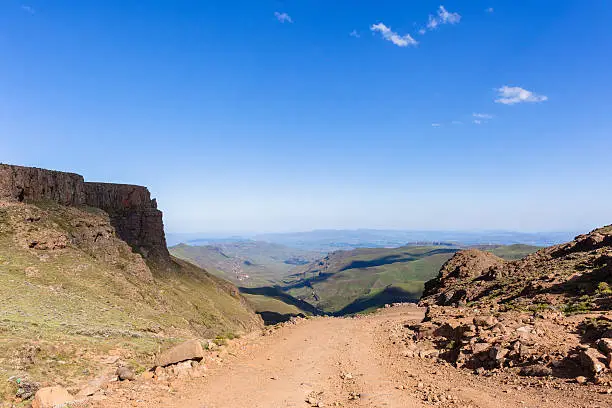 Mountains valley river overlooking horizon landscape Sani-Pass Drakensberg South-Africa.