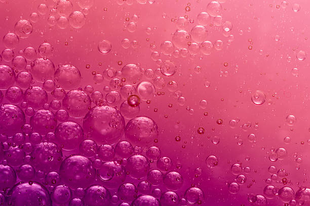 Red bubbles Air, water and oil mixed for a red bubbly effect non alcoholic beverage photos stock pictures, royalty-free photos & images