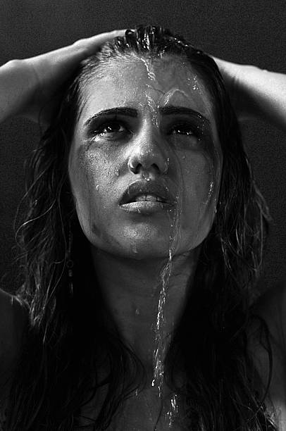 istock Pretty girl with wet face 636820042