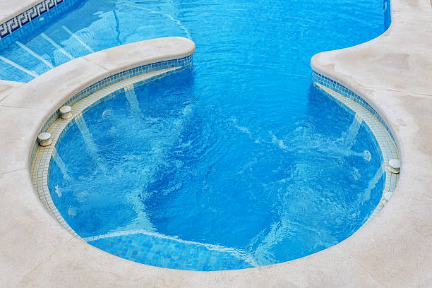 istock hot tub for massage, closeup, built-in pool. 636821246