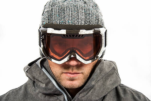 istock Male Skier Wearing Goggles and Ski Cap 636822344