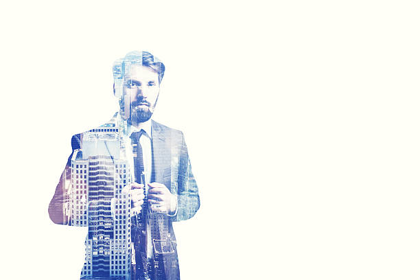 istock Bearded businessman and a blue cityscape 636824034