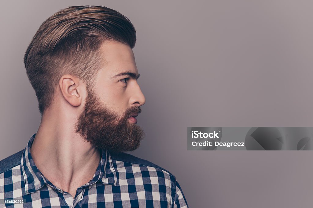 Side view portrait of thinking stylish young man looking away Men Stock Photo