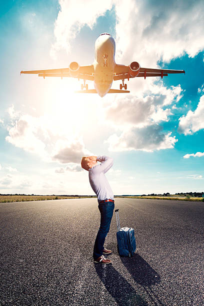 istock Passenger misses his plane and is unhappy and sad 636831308
