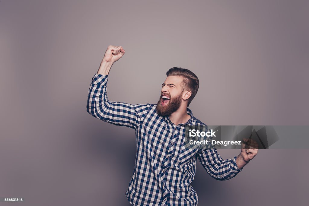 Yes, he did it!  happy bearded man raised hands Yes, he did it! portrait of stylish happy bearded man raised hands and shouting Men Stock Photo
