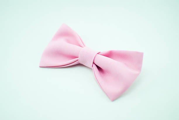 istock Elegant well-designed pink bow-tie. Isolated 636831356