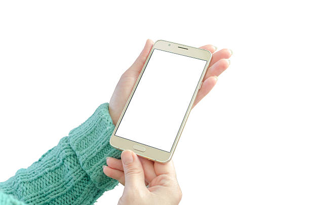 istock Gold smart phone in woman hand. Isolated, white, blank screen. 636831414