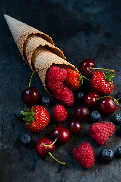 istock fresh fruits in ice cream cones 636833872