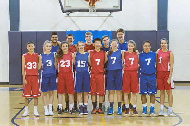 istock A large diverse group of high school athletes in uniforms 636836150
