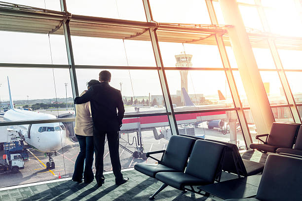 istock Couple in airport 636838426