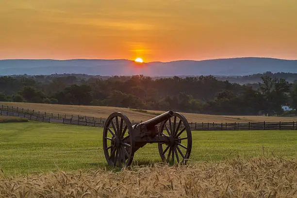 This is a view of the sun rising behind artillery at Antietam National Battlefield in Sharpsburg, Maryland. The battle at Antietam was the bloodiest single-day battle in American history.