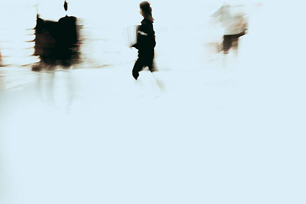 istock Blur business people walking 636841550