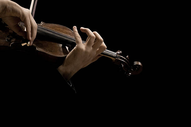 istock Hands of the musician playing a violin 636845388
