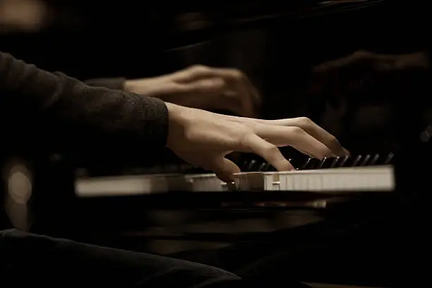 Photo of Hands musician playing the piano