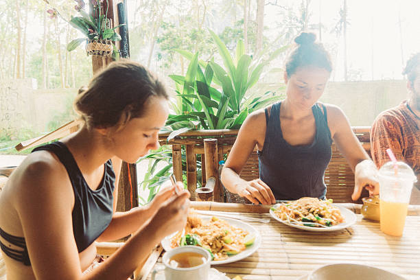 istock Friends have lunch in cafe 636847314