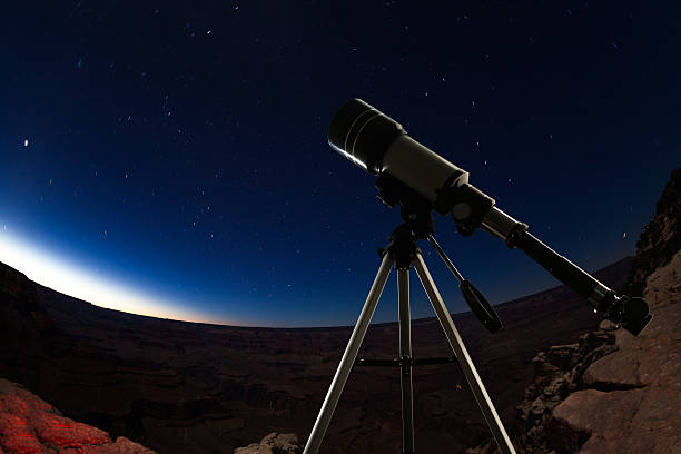 istock Telescope and night sky in Grand Canyon 636857796