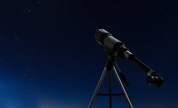 istock One telescope over night clear sky with stars 636857814