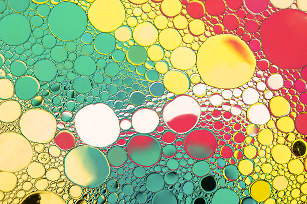 istock Close up of oil drop on water surface. 636859318