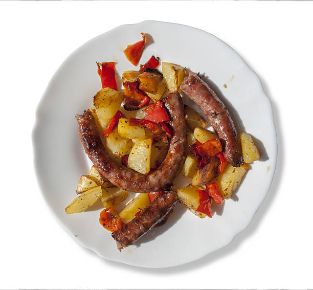 Round plate with sausage, potatoes and peppers