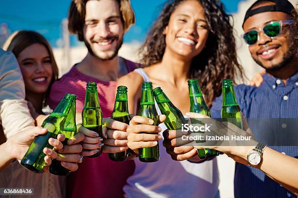 Happy Friends Drinking Beer Outdoors Stock Photo - Download Image Now - Adult, African Ethnicity, African-American Ethnicity