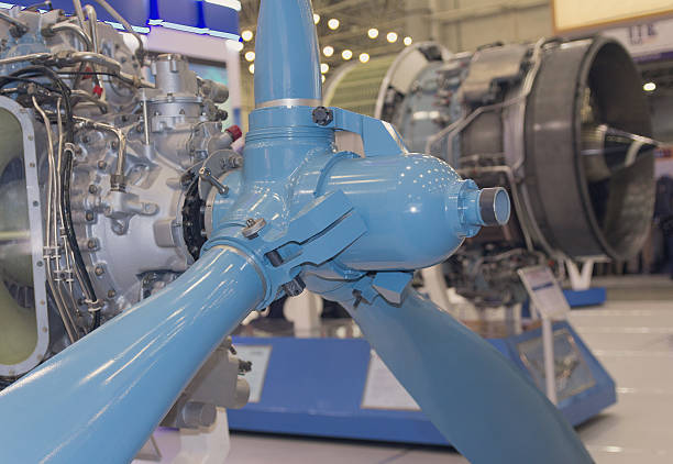 Screw parts and aircraft engine close-up. Industry