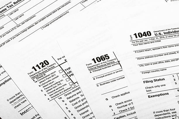 1040,1120,1065 US tax form / taxation concept stock photo