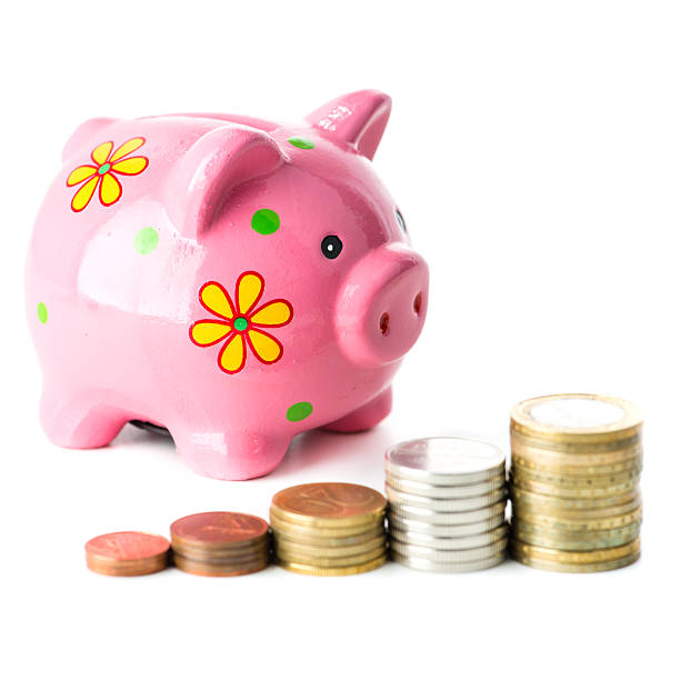 istock piggy bank and a stack of coins isolated ladder 636879304