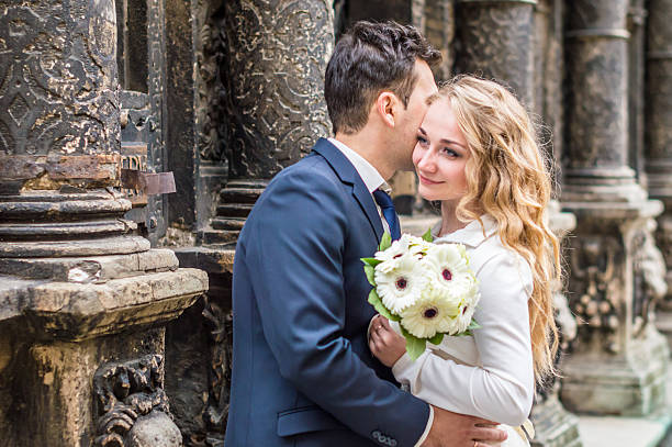 istock newlyweds strolling around the city 636879370