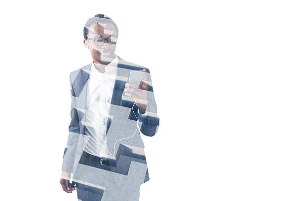 istock African man, music on his cell phone. Labyrinth 636880192