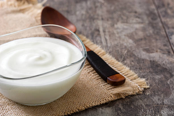 istock Greek yogurt in glass bowl 636881842