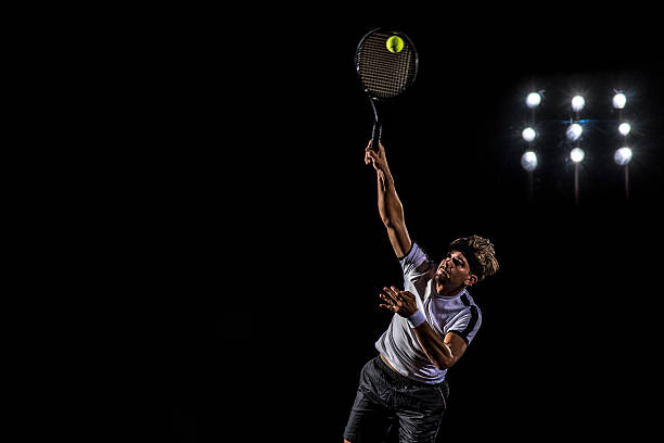istock Playing tennis at court 636883752