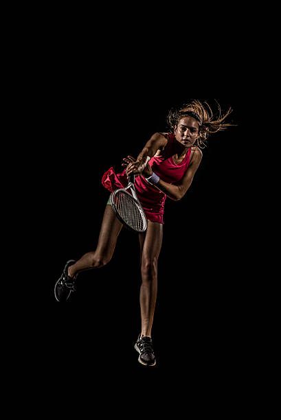 istock Playing tennis at court 636883900